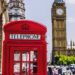 A picture showing UK phone booth in front and in the background is the big ben building