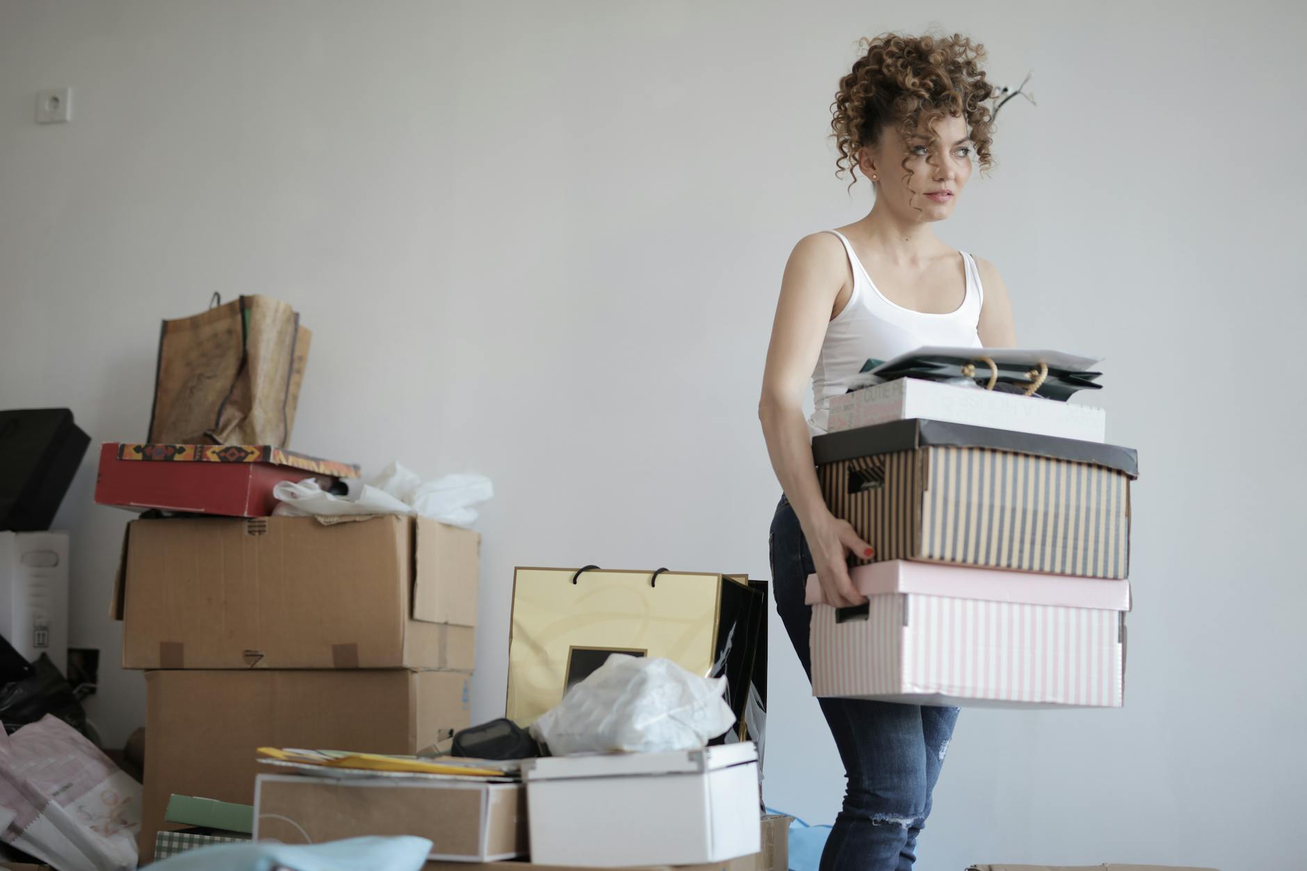 An international students packing for her move to the UK for studies
