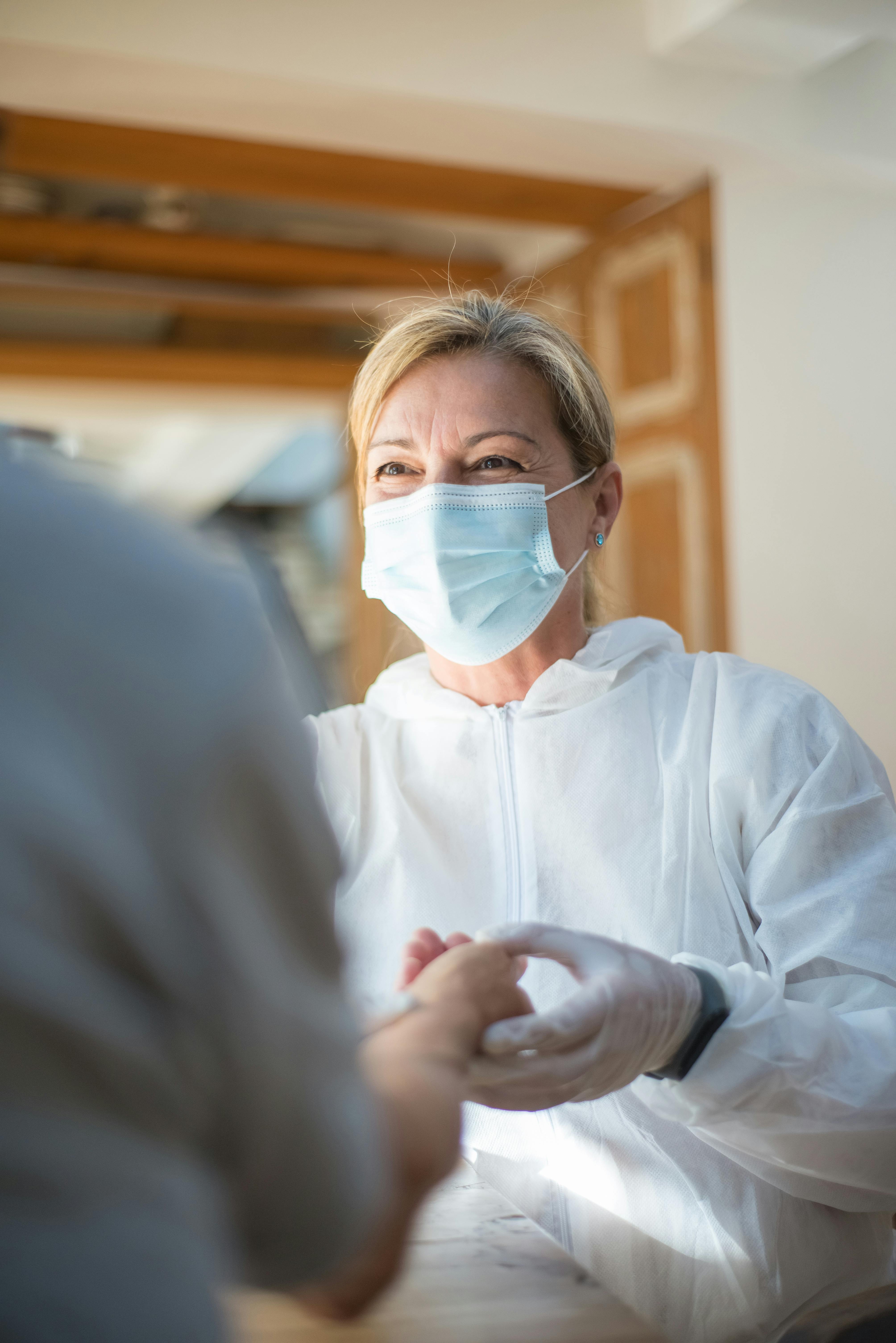 Nurse speaking to a patient