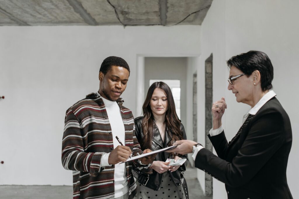 students in the UK discussing with their lecturer