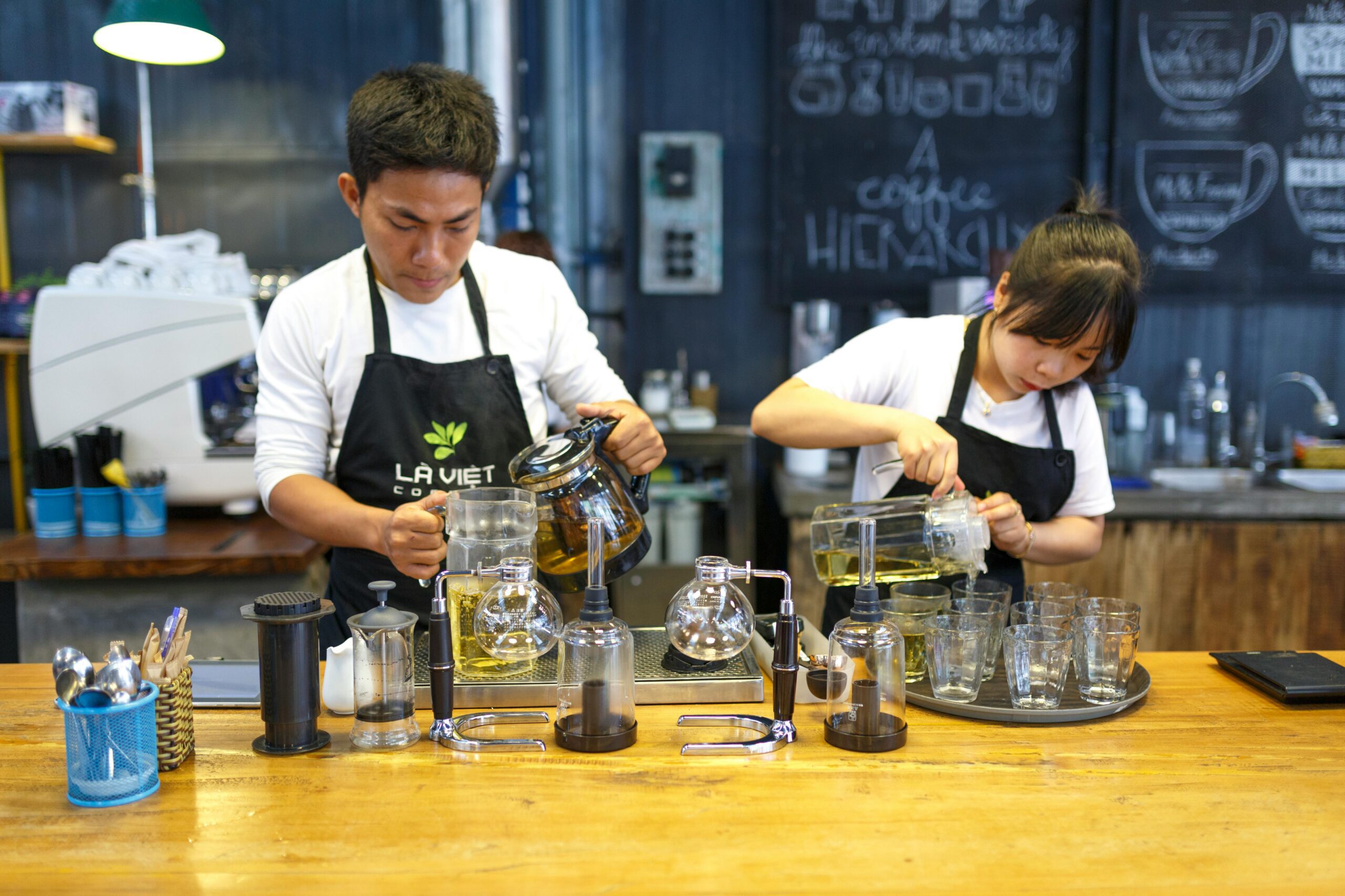 waitresses pouring a drink