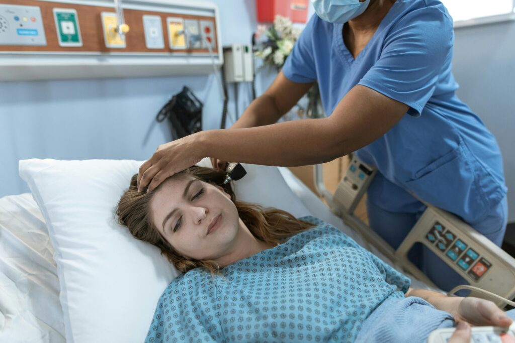 A nurse attending to patient