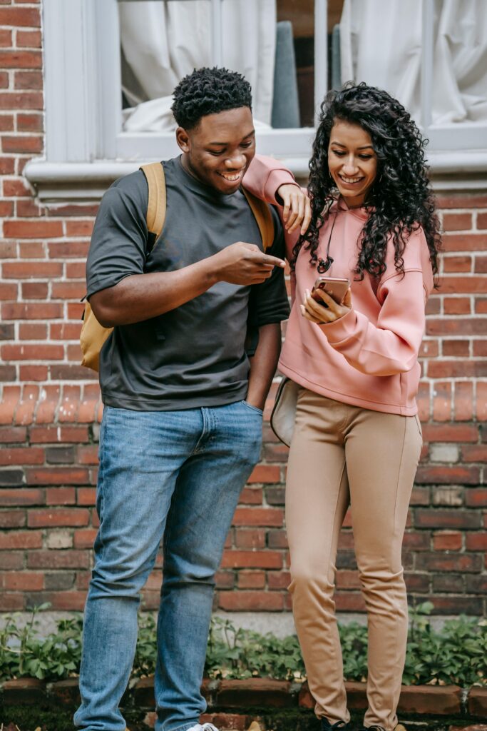 2 students on the phone