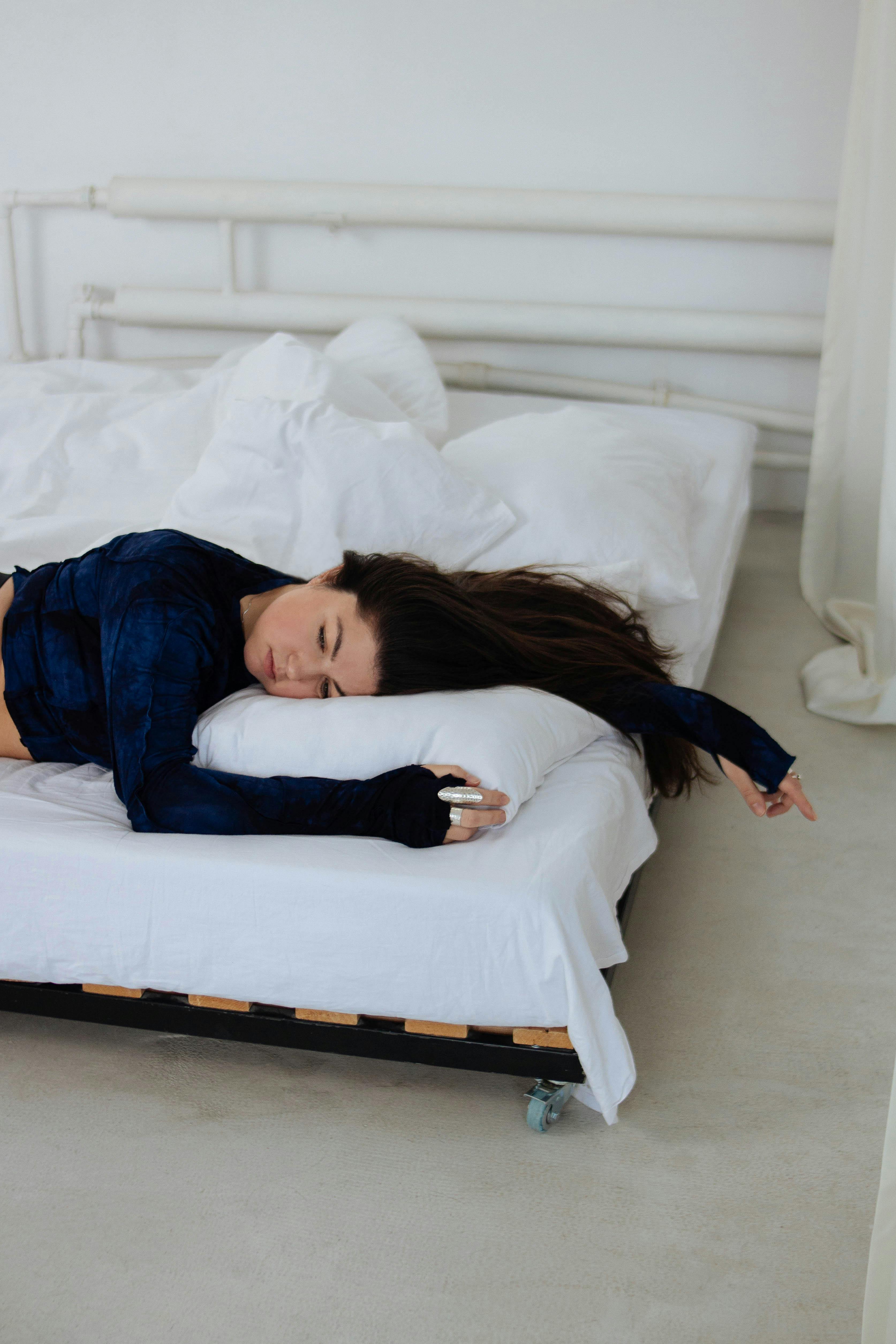 A LADY SLEEPING IN THE STUDENT HOSTEL