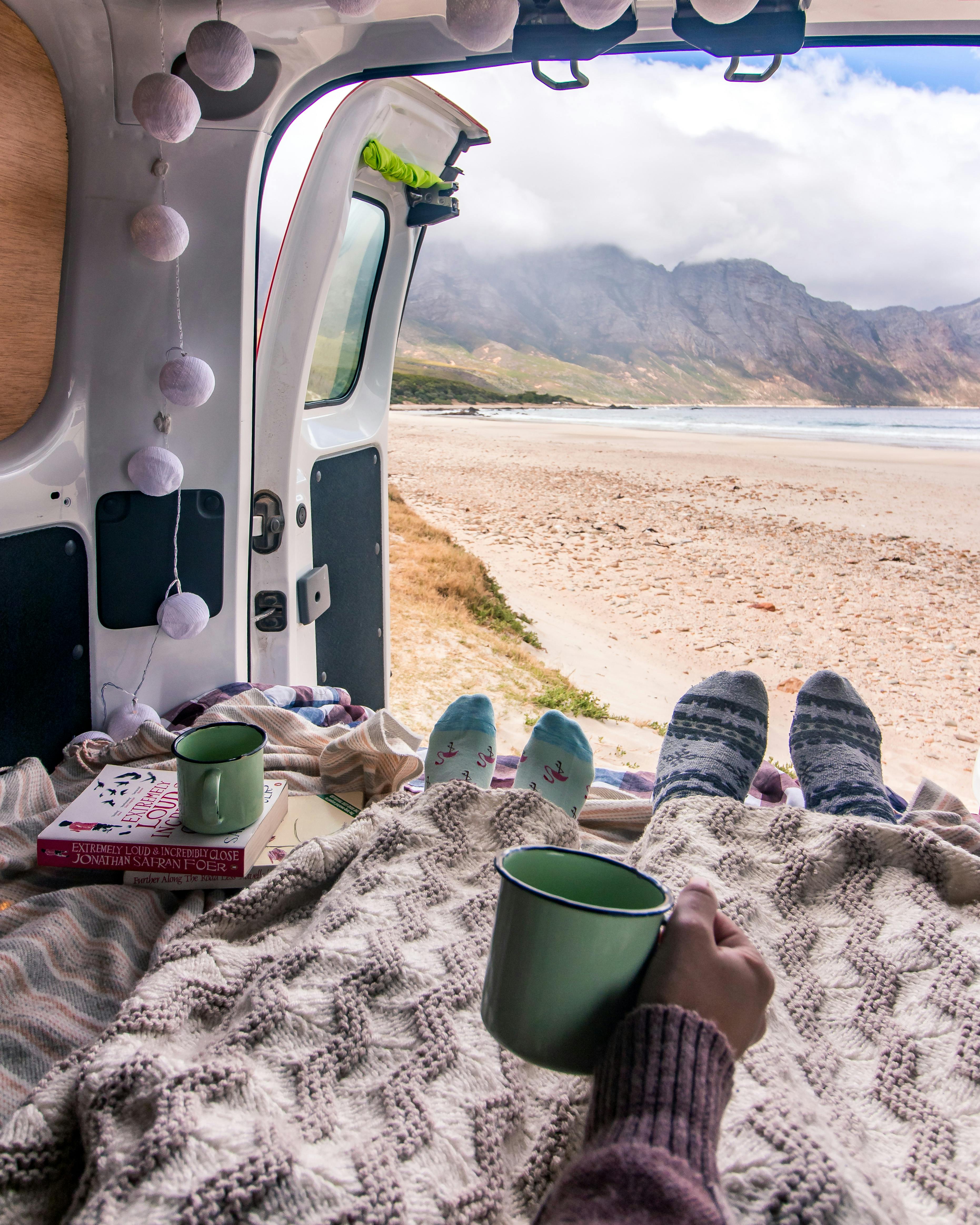 A lady resting in her van