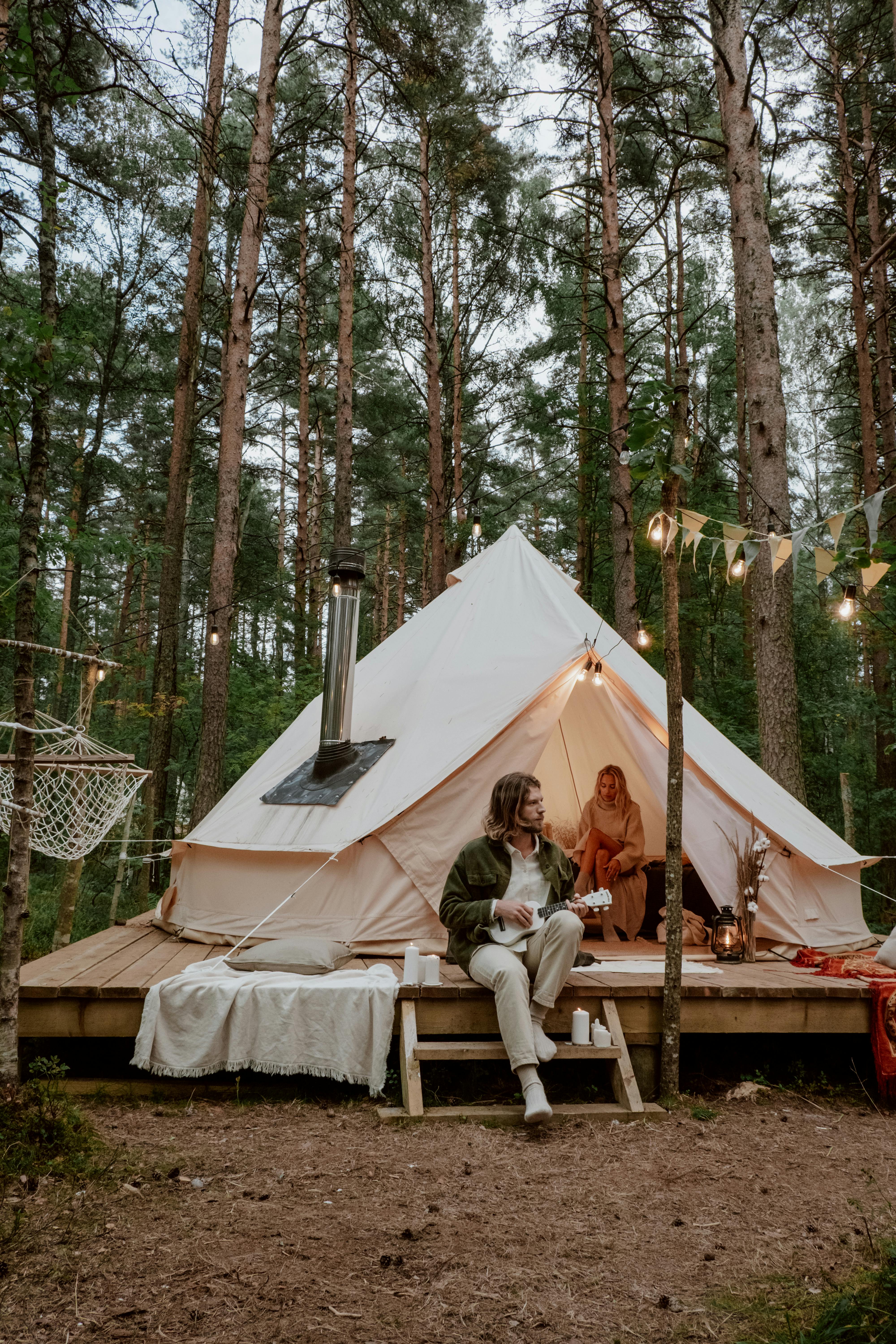 COUPLE DISCUSSING OVER A ROMANTIC CAMPING