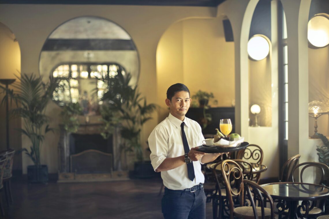 a male waiter in a restaurant