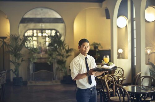 a male waiter in a restaurant