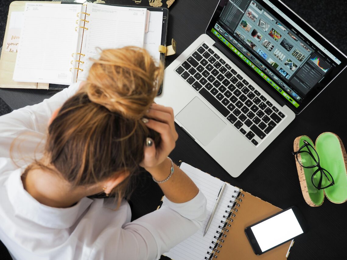 a woman searching for jobs on a laptop