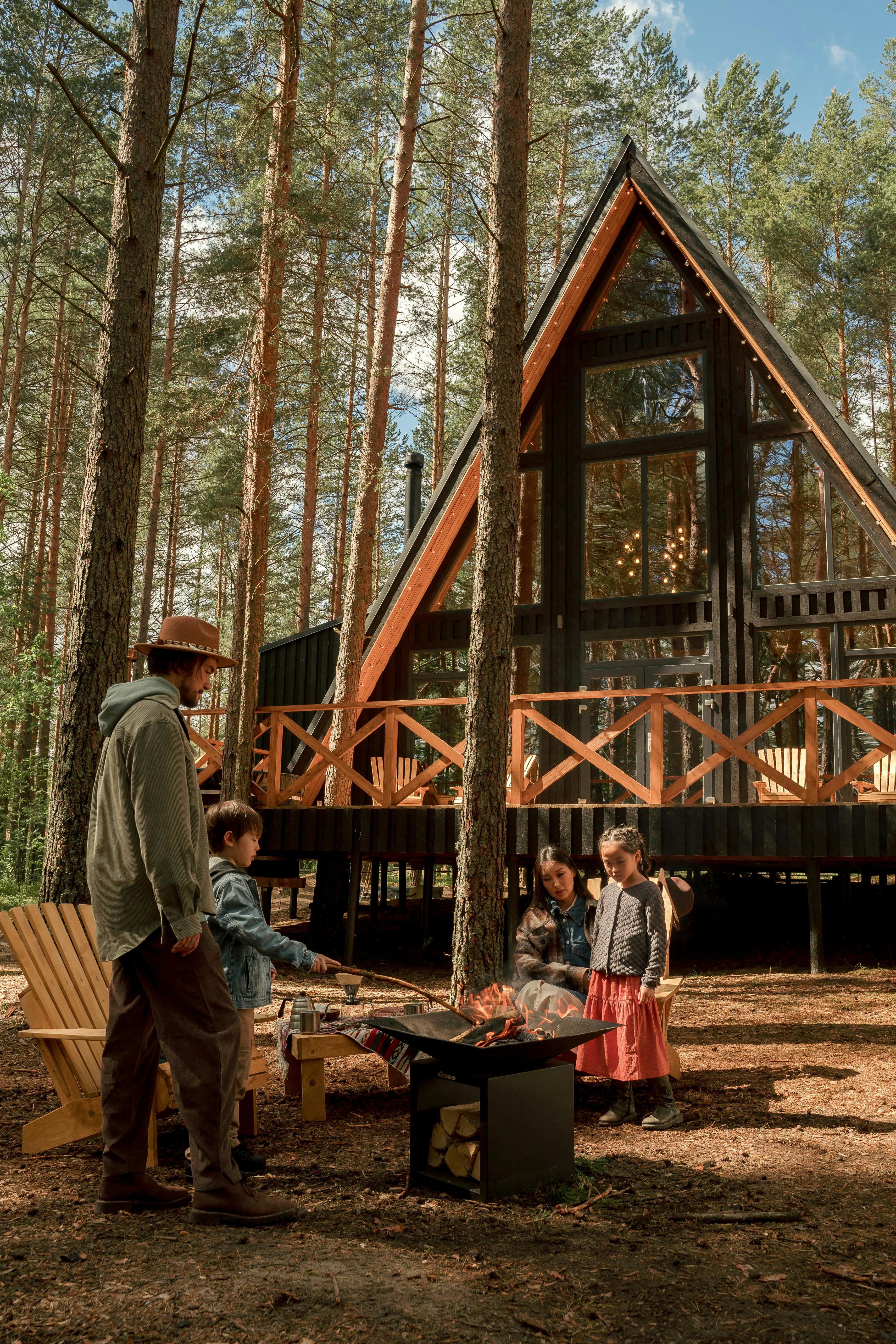 children and parents camping in the woods