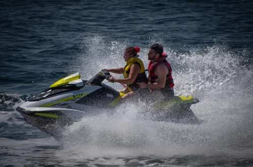 a couple on a jet ski