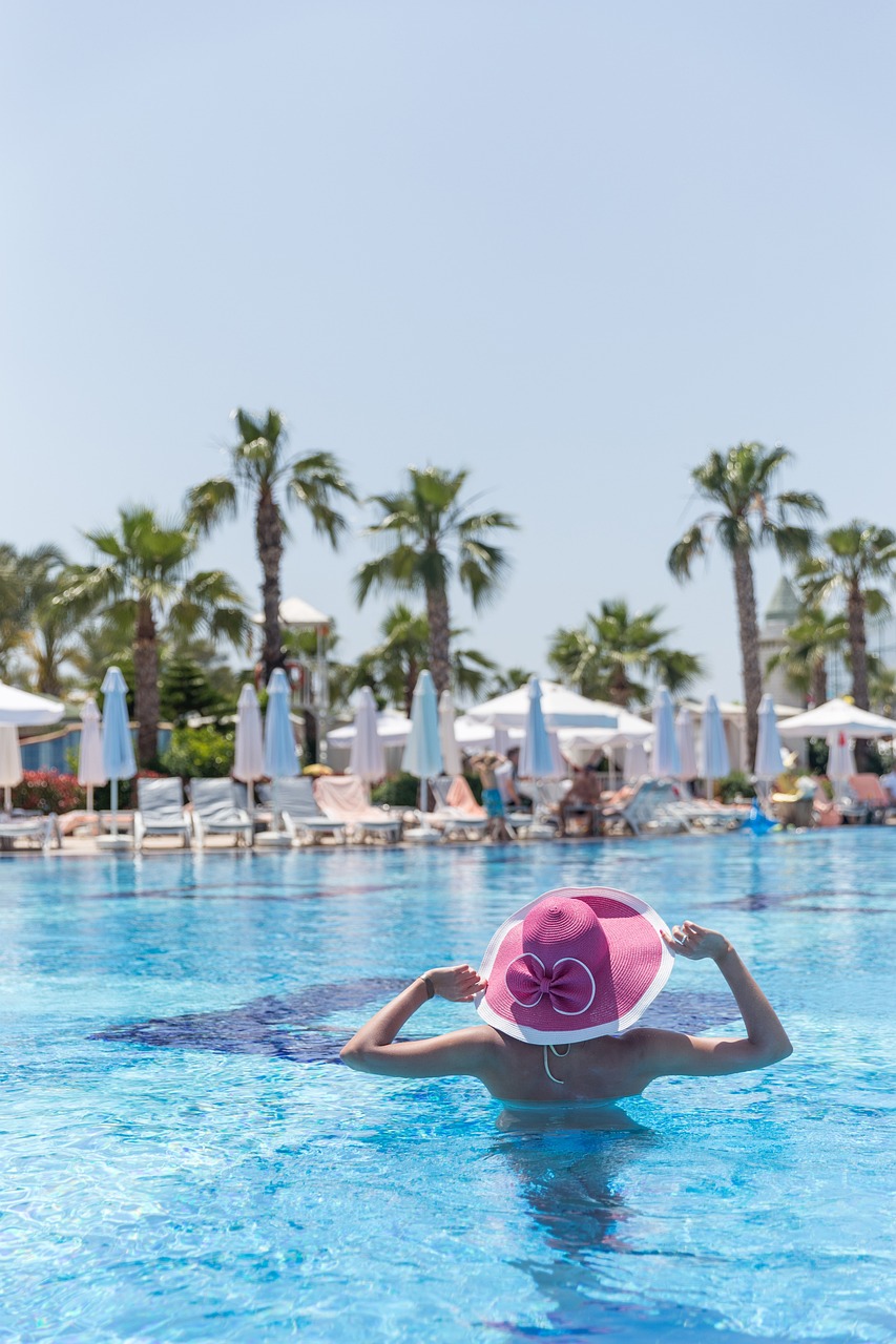 a woman lounging at the pool on holidays