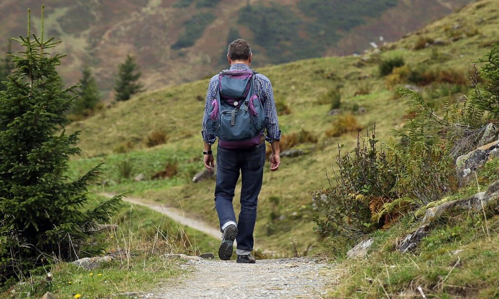 a man hiking in the mountain