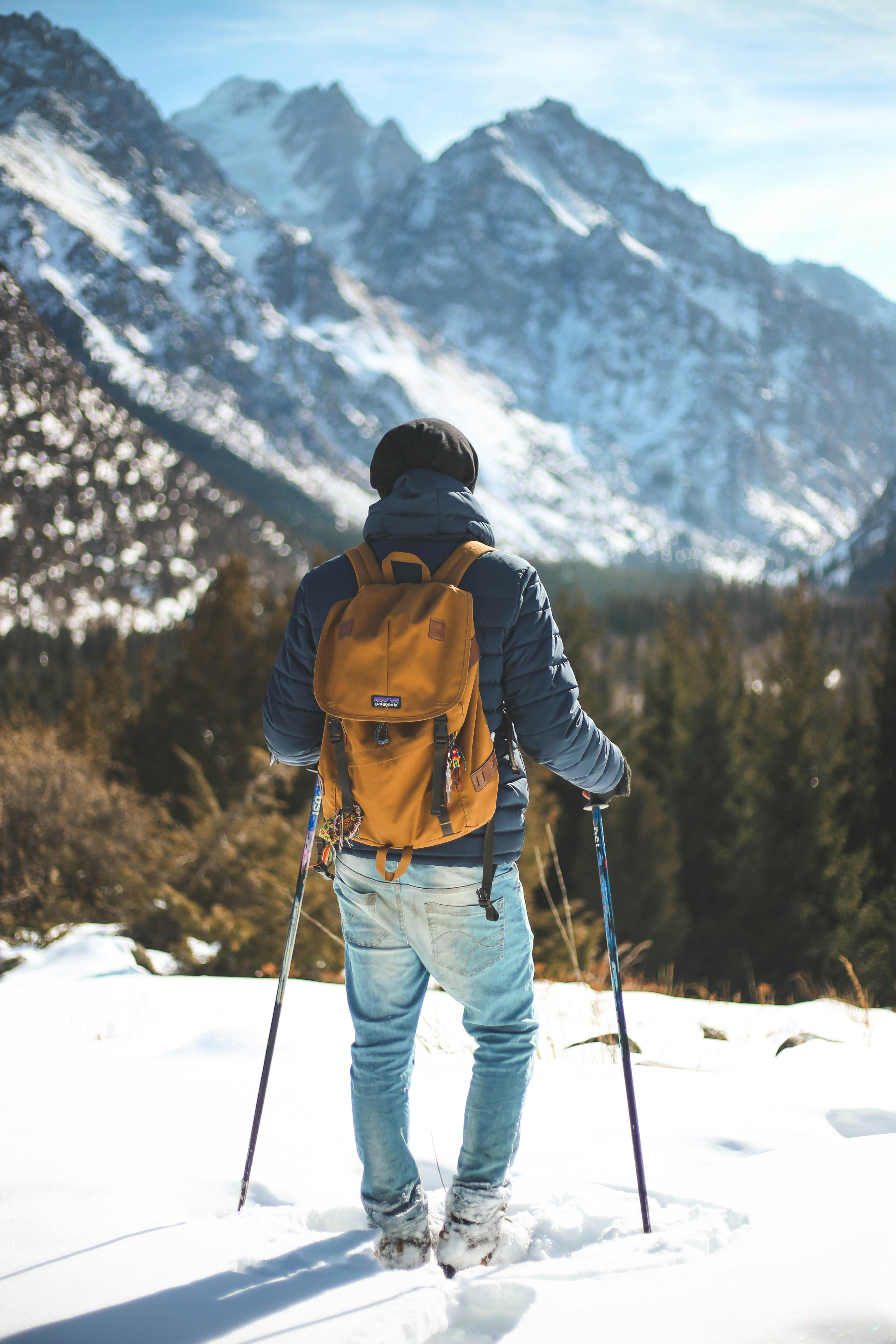 a man hiking in the snow