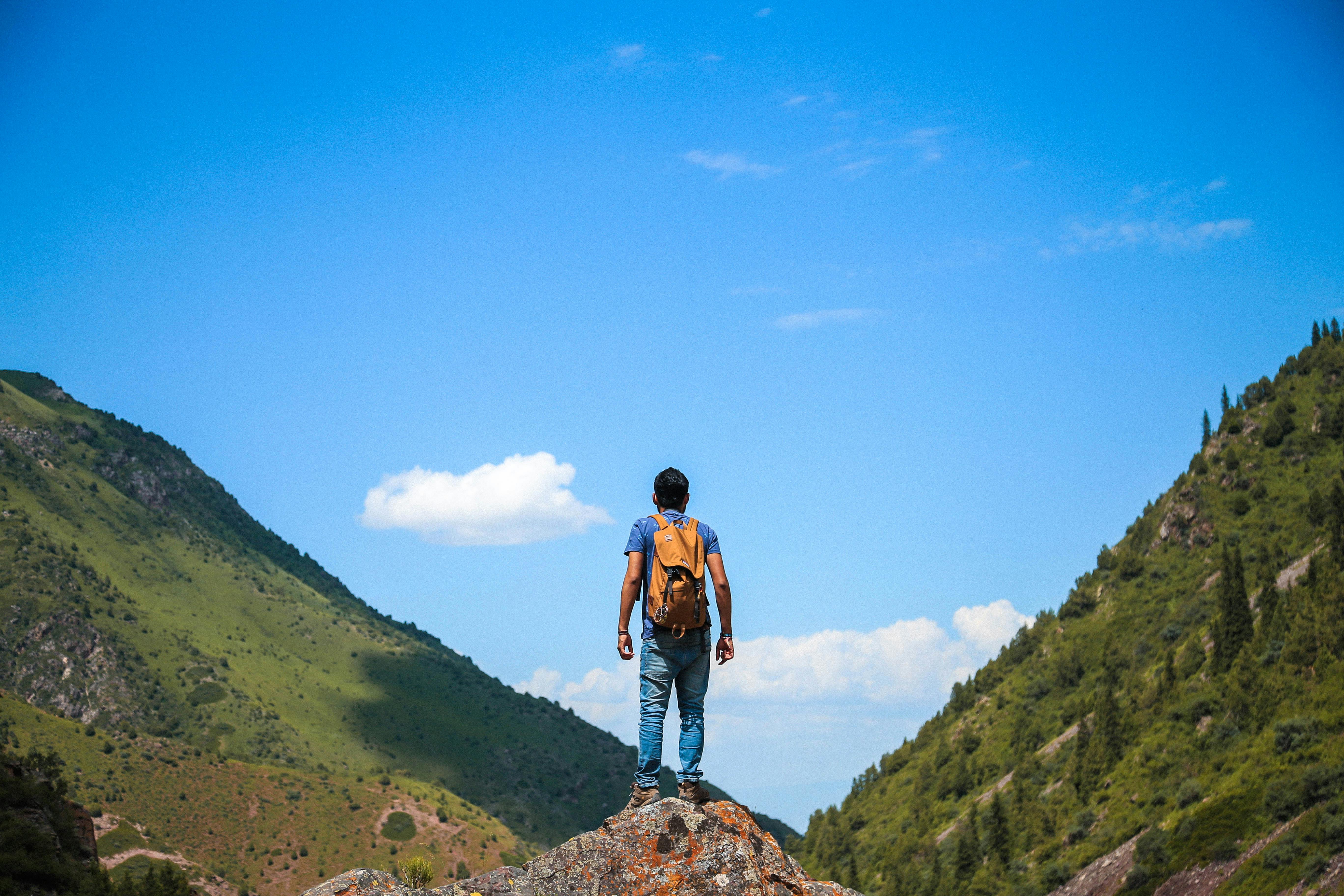 a man standing on a cliff